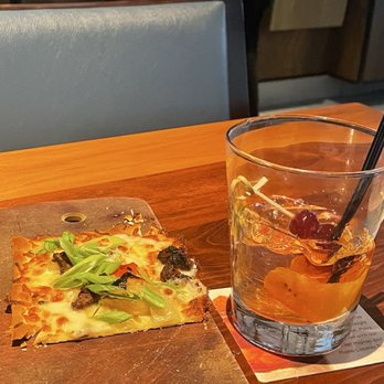 Seasons 52 - What's left of the delicious Philly cheesesteak flat bread. - New American Near Me - Sunrise, Florida Seasons 52 - What's left of the delicious Philly cheesesteak flat bread. - New American Near Me - Sunrise, Florida