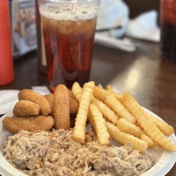 Stamey's Barbecue - Chopped Pork Barbecue Plate with French fries and Hushpuppies - Barbeque Near Me - Greensboro, North Carolina Stamey's Barbecue - Chopped Pork Barbecue Plate with French fries and Hushpuppies - Barbeque Near Me - Greensboro, North Carolina