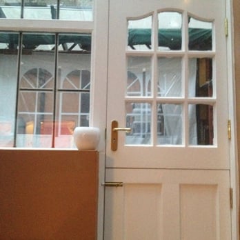 Cherry Court Hotel - Thru a rear entryway leading to the basement floor bedroom. - Hotels Near Me - London, XGL