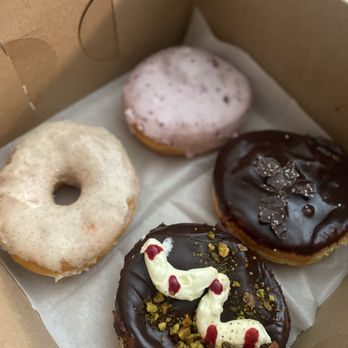 The Goods - Salted Brown butter, seasonal berry, Boston cream and berry pistachio. Yum! - Donuts Near Me - Carlsbad, California
