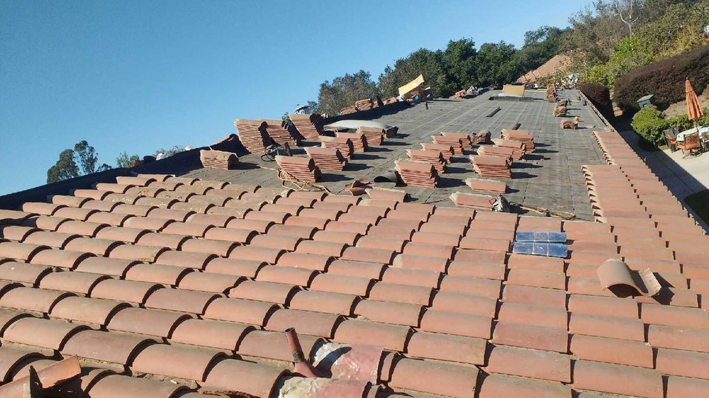 Slide of Eddies Roofing