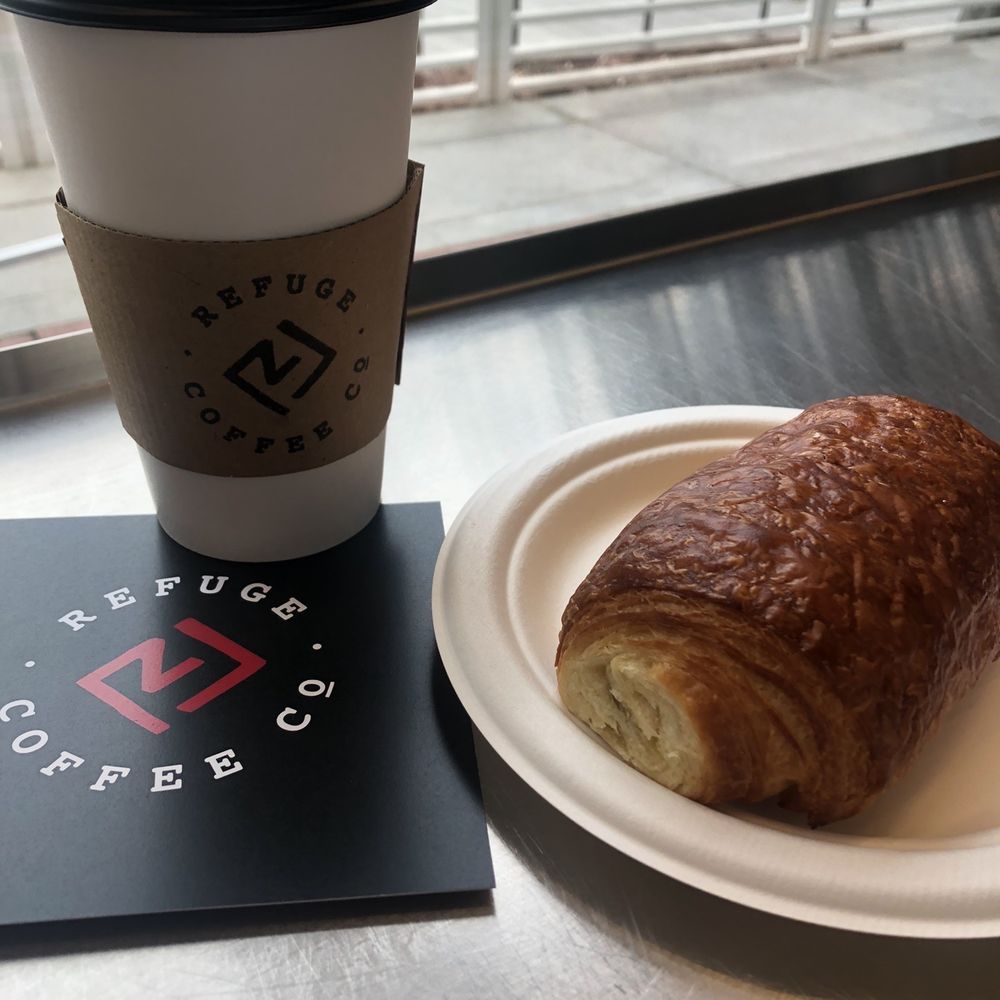 Refuge Coffee - Midtown - Chocolate croissant and medium chai latte - Coffee & Tea Near Me - Atlanta, Georgia Refuge Coffee - Midtown - Chocolate croissant and medium chai latte - Coffee & Tea Near Me - Atlanta, Georgia