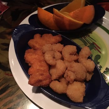 Rainforest Cafe - Kid fried shrimp and nuggets with fruit on the side - American Near Me - Grapevine, Texas Rainforest Cafe - Kid fried shrimp and nuggets with fruit on the side - American Near Me - Grapevine, Texas