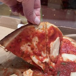 Pizzeria Montagna - Runny tomato puddle, with cold fresh mozzarella (cold)