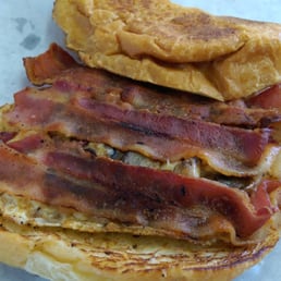 Hodag with egg, bacon and smoked gouda on croissant.