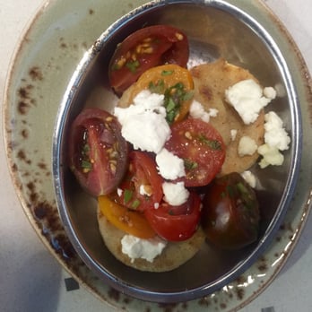 Manna Restaurant - Side of masa cakes with goat cheese and tomatoes - New American Near Me - Castle Rock, Colorado