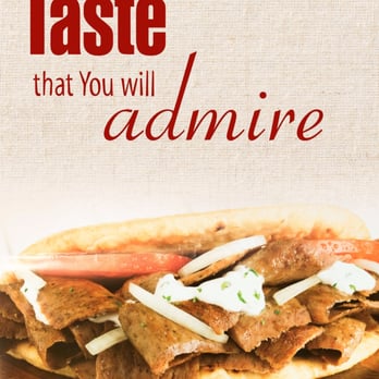 Donair Affair - a tasty sandwich on a wooden cutting board - Lebanese Near Me - Surrey, British Columbia Donair Affair - a tasty sandwich on a wooden cutting board - Lebanese Near Me - Surrey, British Columbia