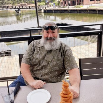Yard House - Enjoying the outdoor seating and onion ring tower appetizer on our 32nd anniversary. - Vegetarian Near Me - Gaithersburg, Maryland Yard House - Enjoying the outdoor seating and onion ring tower appetizer on our 32nd anniversary. - Vegetarian Near Me - Gaithersburg, Maryland