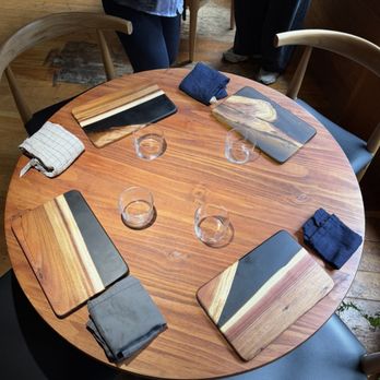 Komakase Coffee - Table setting - mixed stone and wood boards. - Pop-Up Restaurants Near Me - San Francisco, California