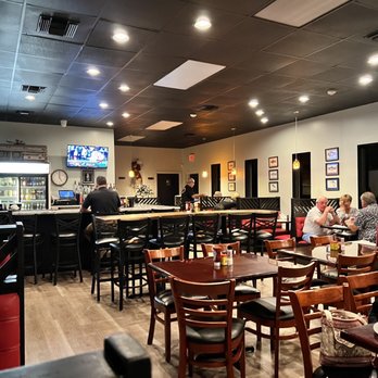Red Grouper Tavern - people sitting at the bar - Seafood Near Me - Venice, Florida Red Grouper Tavern - people sitting at the bar - Seafood Near Me - Venice, Florida