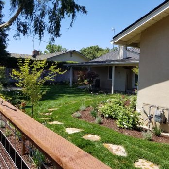 D A Landscape Services - a fenced in yard - Tree Services Near Me
