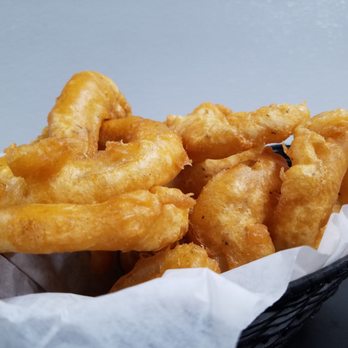 The Place in Protivin - a basket of onion rings - Sports Bars Near Me - Protivin, Iowa The Place in Protivin - a basket of onion rings - Sports Bars Near Me - Protivin, Iowa