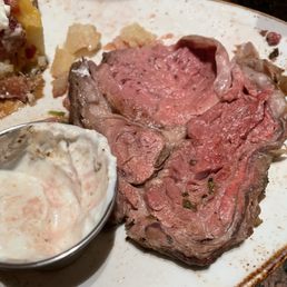 English cut prime rib/ baked potato/ broccoli English cut prime rib/ baked potato/ broccoli