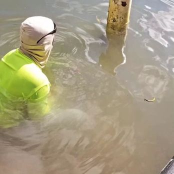 Pro Cut Concrete Cutting - Under water chain sawing into an existing manhole structure in Hollywood, Florida - Masonry/Concrete Near Me Pro Cut Concrete Cutting - Under water chain sawing into an existing manhole structure in Hollywood, Florida - Masonry/Concrete Near Me