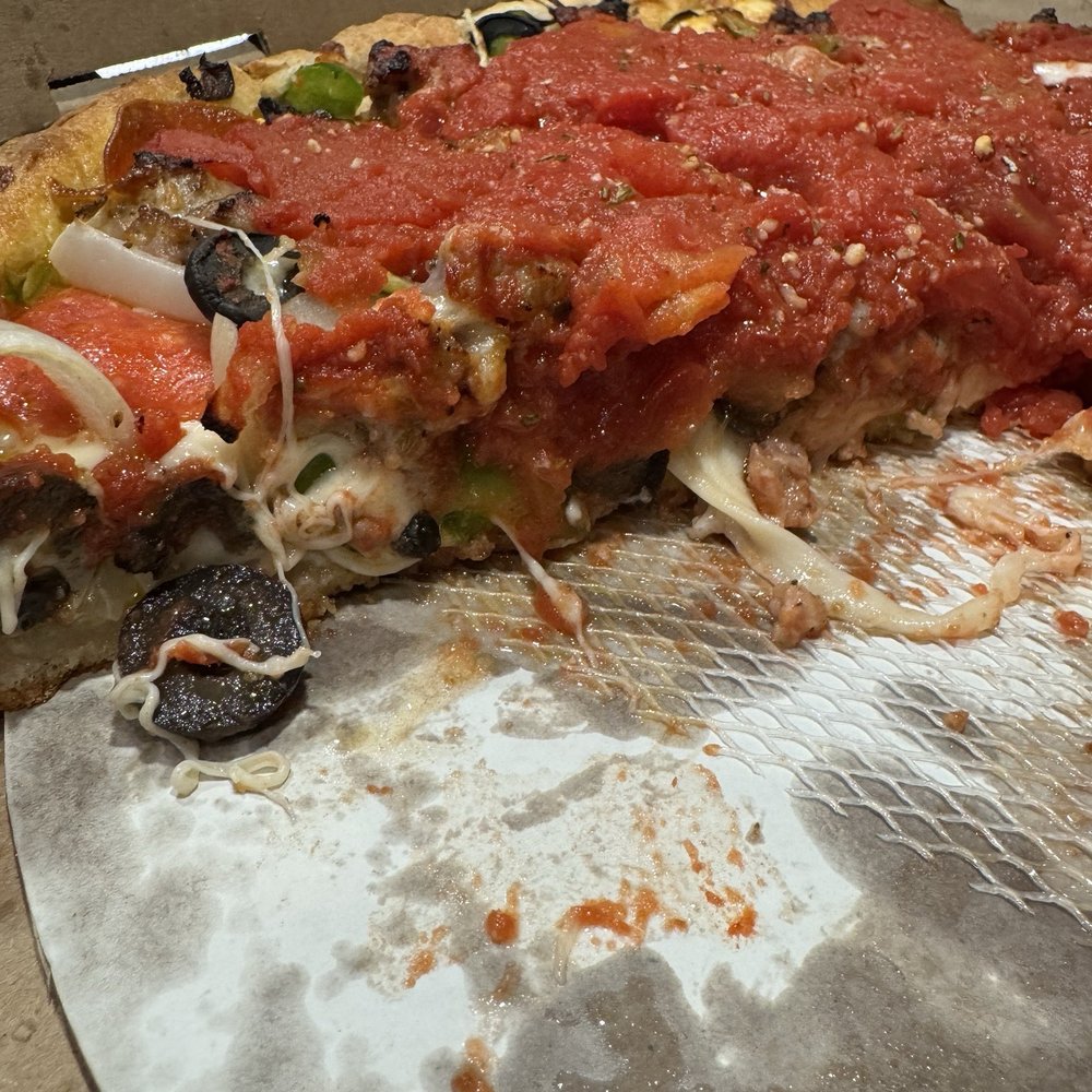 Rosati's Pizza - Marietta - 14" Chicago Classic Combo Deep dish - side view with slice removed. - Pizza Near Me - Marietta, Georgia Rosati's Pizza - Marietta - 14" Chicago Classic Combo Deep dish - side view with slice removed. - Pizza Near Me - Marietta, Georgia
