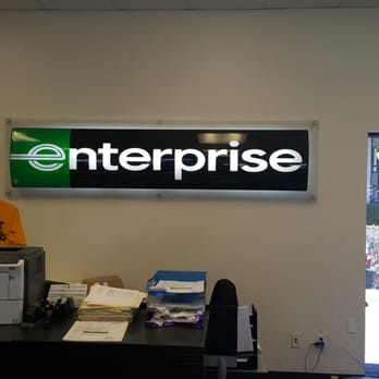 Enterprise Rent-A-Car - Signage behind counter - Car Rental Near Me - Santa Clara, California