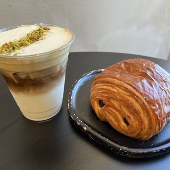 Frame Coffee Roasters - Pistachio cream latte and chocolate croissant - Coffee Roasteries Near Me - Vienna, Virginia