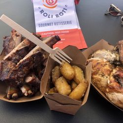 Roli Roti Gourmet Rotisserie - Ribs, potatoes, half rotisserie chicken.