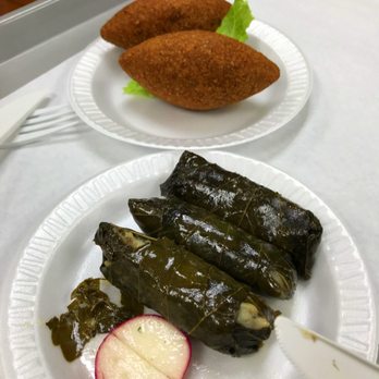 Shawarma Mediterranean Grill - Kibbe and Grape Leave wraps (we got 4, I had already eaten one before the photo) - Mediterranean Near Me - Miami, Florida