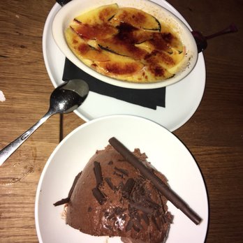 Amelie - Dessert. Chocolate mousse and creme brûlée topped with peaches. - French Near Me - New York, New York Amelie - Dessert. Chocolate mousse and creme brûlée topped with peaches. - French Near Me - New York, New York