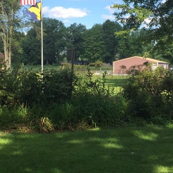 A+ Lawn Scapes - (Before picture) Front Island bed project. - Gutter Services Near Me