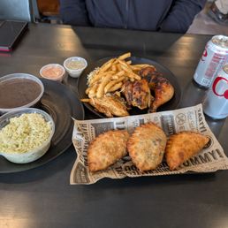 Empanada combo and half chicken meal.