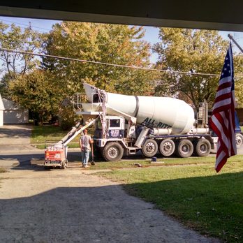Ron Perkins construction. - a cement truck parked in front of a house - General Contractors Near Me - Cincinnati, Ohio Ron Perkins construction. - a cement truck parked in front of a house - General Contractors Near Me - Cincinnati, Ohio
