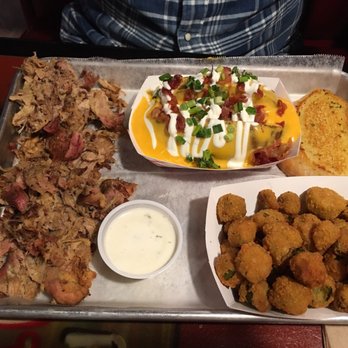 Graham's Smokehouse - Pulled pork platter with fried okra & baked potato. - Smokehouse Near Me - Cape Canaveral, Florida Graham's Smokehouse - Pulled pork platter with fried okra & baked potato. - Smokehouse Near Me - Cape Canaveral, Florida