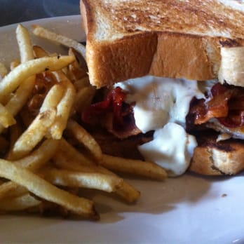 Meddlesome Moth - Hot Brown..chicken sandwich with grilled tomatoes, bacon and momay sauce on toasted brioche - Bars Near Me - Dallas, Texas