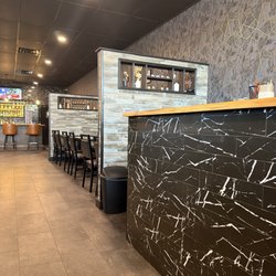 Ninja Sushi Asian Bistro - Front waiting area