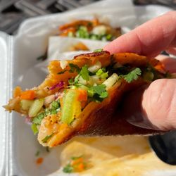 K Rico To Go - Shrimp taco (mid bite)