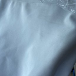 Remaining stains after i had them clean the dress twice! Horrible service ! I repeat do no support this business .