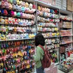 Yoho Fashion - Wall of keychains and stuffed toys on chains