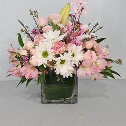 Flowers By Laney - Casual table piece in low square glass vase.