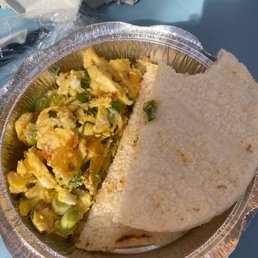 Huevos Pericos with Arepa Blanca Huevos Pericos with Arepa Blanca