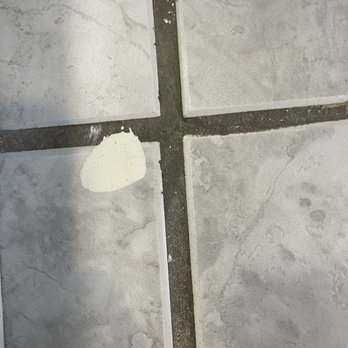A1 Drywall - Get ready for cleanup with a razor to get the plaster off the tile and grout - Drywall Installation & Repair Near Me - San Francisco, California