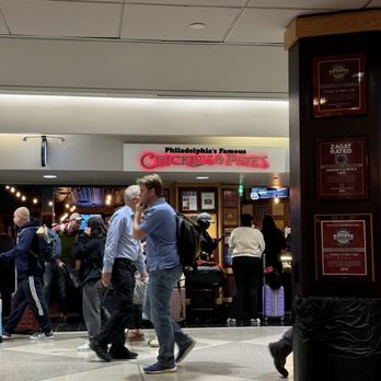 Chickie’s and Pete’s - ows people walking through a mall - Sports Bars Near Me - Philadelphia, Pennsylvania