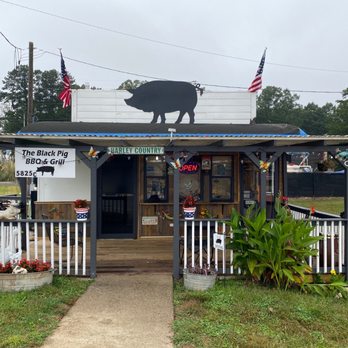 The Black Pig BBQ & Grill - the front of the restaurant - American Near Me - Buford, Georgia The Black Pig BBQ & Grill - the front of the restaurant - American Near Me - Buford, Georgia
