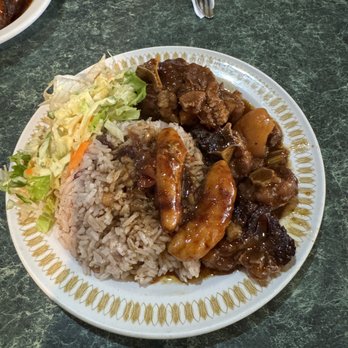 Riddim & Spice - Oxtail plate - Caribbean Near Me - Vancouver, British Columbia Riddim & Spice - Oxtail plate - Caribbean Near Me - Vancouver, British Columbia