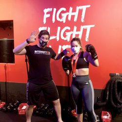 IntensityX3 Fitness & Kickboxing - Coach Ethan and me post leveling up