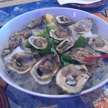 Micelis Waterfront Restaurant - Oysters on the half shell - Italian Near Me - Matlacha, Florida Micelis Waterfront Restaurant - Oysters on the half shell - Italian Near Me - Matlacha, Florida