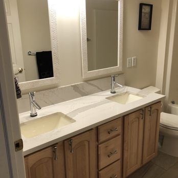 KSI Kitchen & Bath - Cambria counter with under mount sinks and Delta touchless faucets. - Kitchen & Bath Near Me - Ann Arbor, Michigan