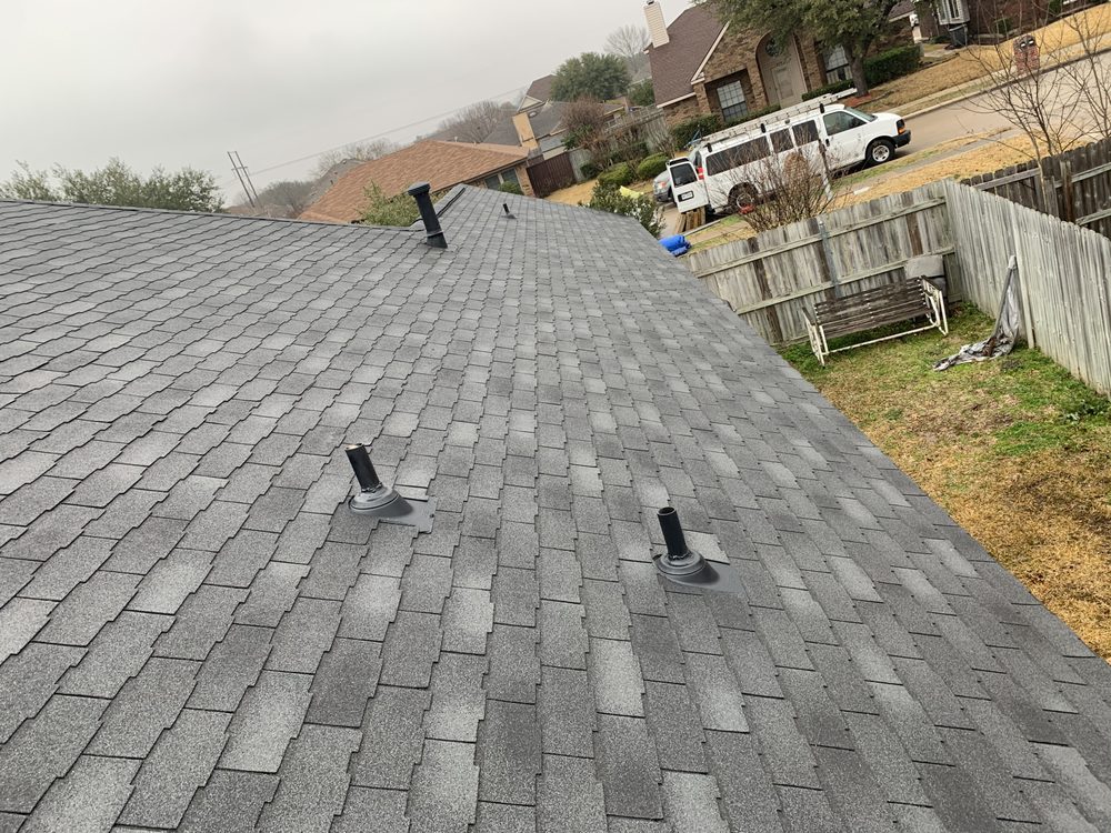 Slide of Design Roofing & General Contractors