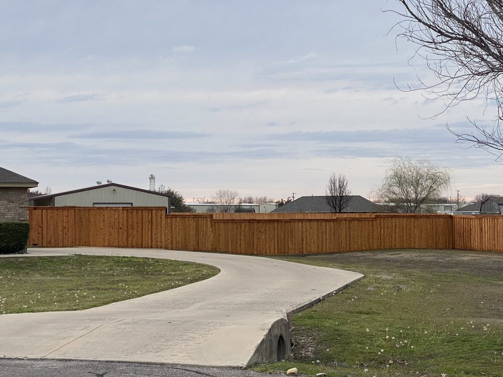 Slide of Grizzly Fence and Patio