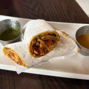 Masala Box - Bombay Frankie with chicken (kati roll, has a bit of a kick) - Indian Near Me - Bayside, New York Masala Box - Bombay Frankie with chicken (kati roll, has a bit of a kick) - Indian Near Me - Bayside, New York