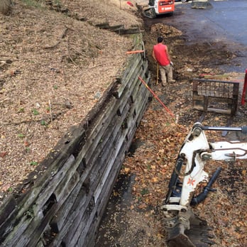 Butler Landscaping - Old railroad tie wall being removed. - Landscaping Near Me - Pittsburgh, Pennsylvania Butler Landscaping - Old railroad tie wall being removed. - Landscaping Near Me - Pittsburgh, Pennsylvania