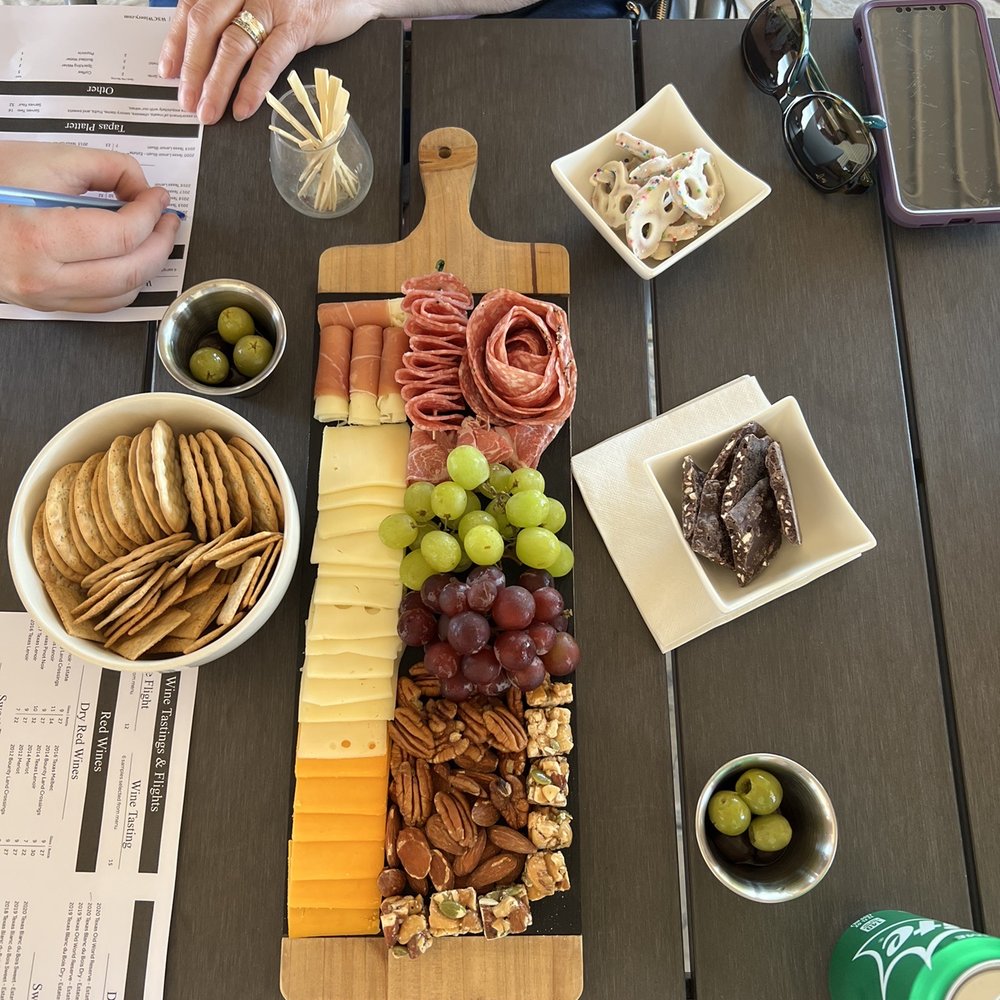 West Sandy Creek Winery - a platter of cheese, crackers, and grapes - Wineries Near Me - Richards, Texas West Sandy Creek Winery - a platter of cheese, crackers, and grapes - Wineries Near Me - Richards, Texas