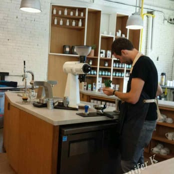 Pilot Coffee Roasters - a man preparing coffee - Coffee & Tea Near Me - Toronto, Ontario