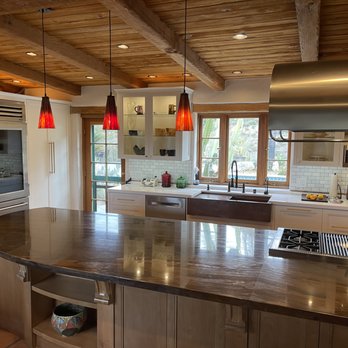 Cabinets By Design - a kitchen with a large island - Flooring Near Me - Escondido, California