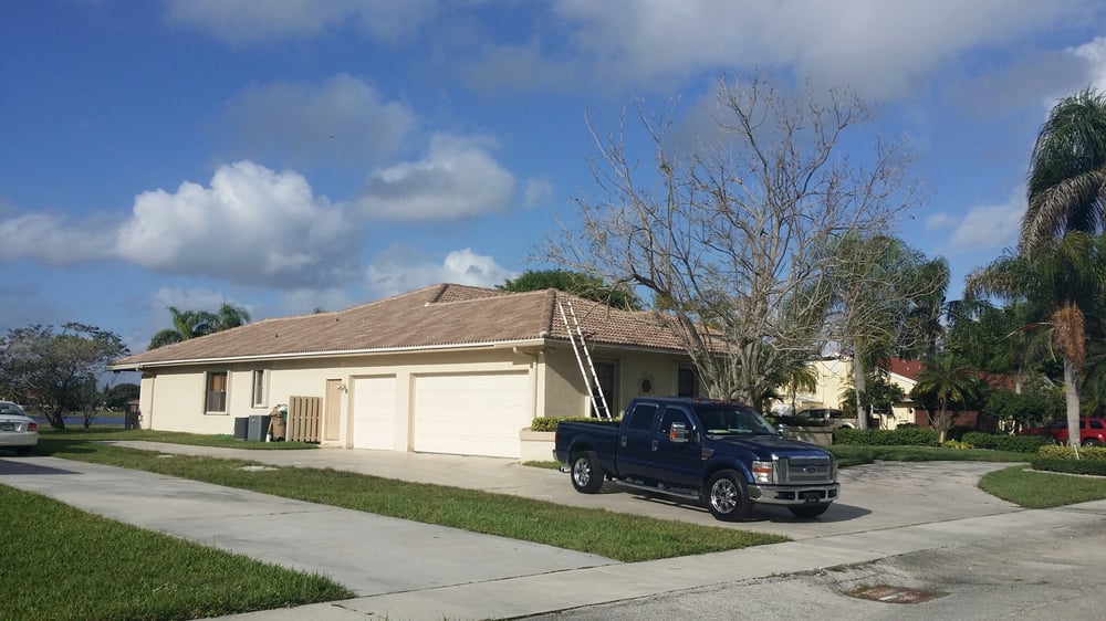 Slide of Thompsons Roofing